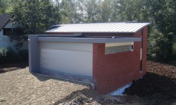 Toiture courbe en zinc et toit plat en EPDM à Neupré